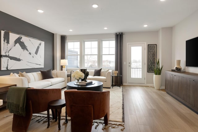 906 Woodlawn Ave Unit D, Saint Paul, MN 55116 - living room with light wood-type flooring, plenty of natural light, recessed lighting, and baseboards