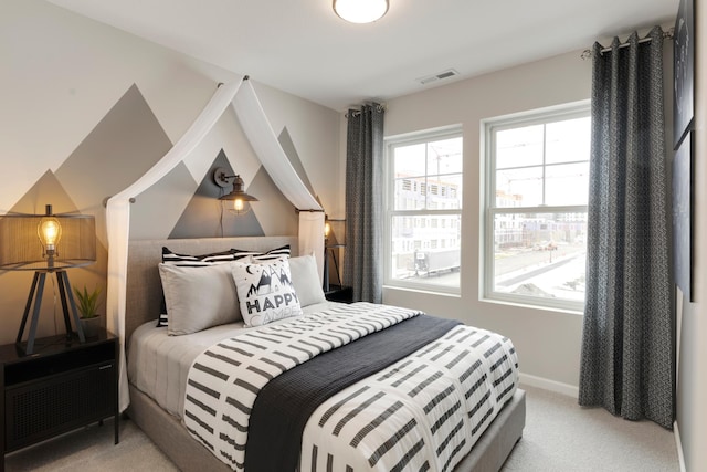 906 Woodlawn Ave Unit D, Saint Paul, MN 55116 - bedroom featuring light carpet