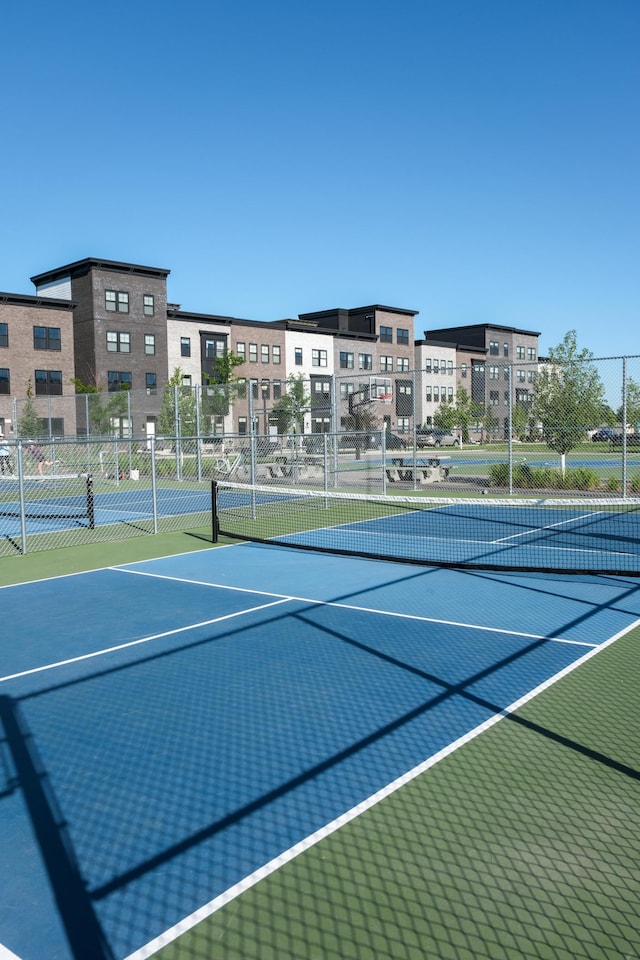 906 Woodlawn Ave Unit D, Saint Paul, MN 55116 - view of tennis court with community basketball court