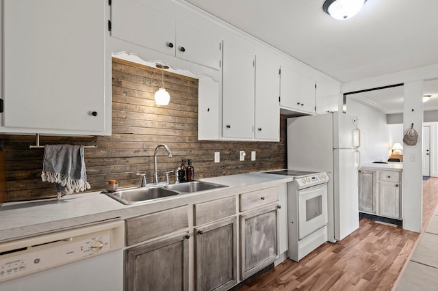 460 Broadway St E, New Germany, MN 55367 - kitchen with white appliances, light wood finished floors, white cabinetry, backsplash, and light countertops