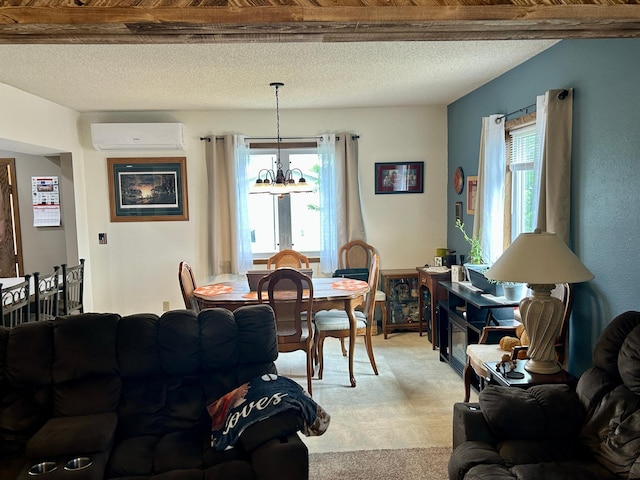 214 2nd St SW, Wadena, MN 56482 - living area featuring a wall mounted air conditioner, a chandelier, plenty of natural light, and a textured ceiling