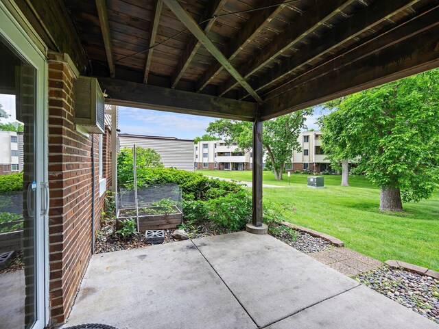 10720 Rockford Rd Unit 113, Plymouth, MN 55442 - view of patio featuring a garden