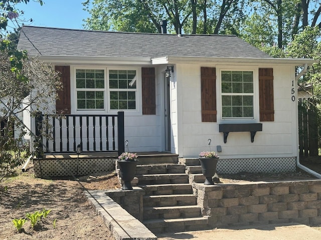 150 Locust St, Mahtomedi, MN 55115 - view of front facade featuring roof with shingles