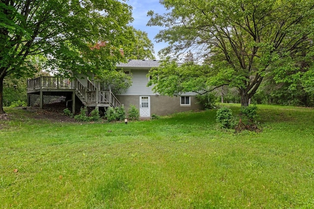 8309 39th St N, Lake Elmo, MN 55042 - view of grassy yard featuring a deck and stairs
