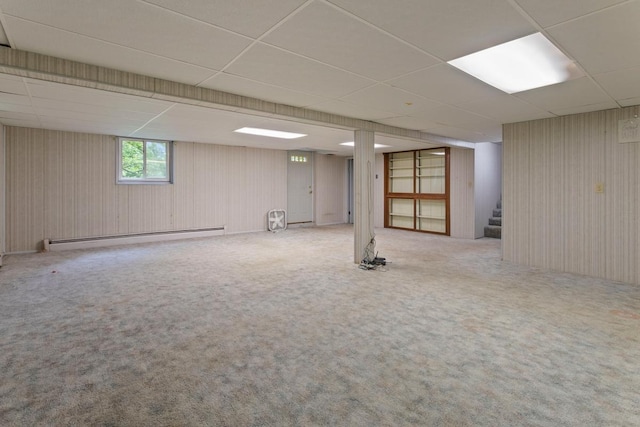 8309 39th St N, Lake Elmo, MN 55042 - below grade area with a drop ceiling, stairway, baseboard heating, and carpet flooring