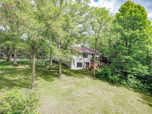 1941 230th St, Saint Croix Falls, WI 54024 - view of green lawn with stairway and a wooden deck