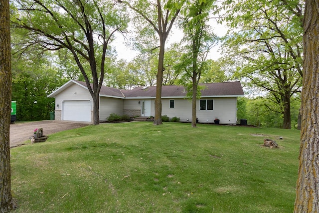 1941 230th St, Saint Croix Falls, WI 54024 - single story home with asphalt driveway, an attached garage, and a front yard