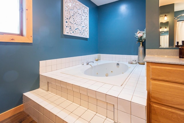 1941 230th St, Saint Croix Falls, WI 54024 - full bathroom with vanity and a tub with jets