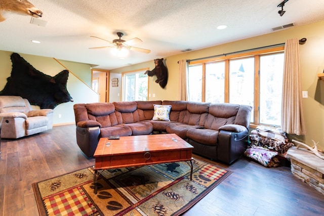 1941 230th St, Saint Croix Falls, WI 54024 - living area with a textured ceiling, ceiling fan, wood finished floors, and recessed lighting