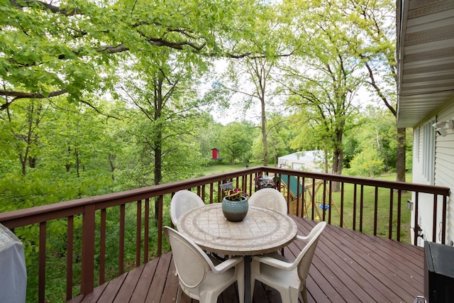 1941 230th St, Saint Croix Falls, WI 54024 - wooden deck with outdoor dining space