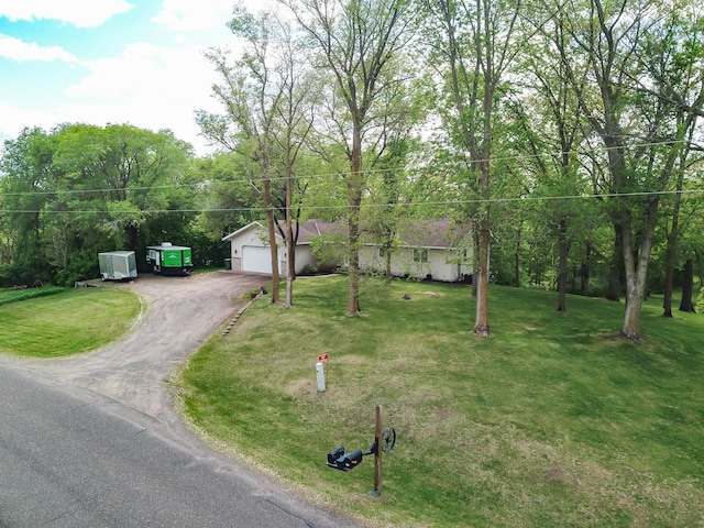1941 230th St, Saint Croix Falls, WI 54024 - single story home featuring a garage and a front yard