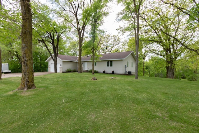 1941 230th St, Saint Croix Falls, WI 54024 - ranch-style home with driveway, a front lawn, and cooling unit
