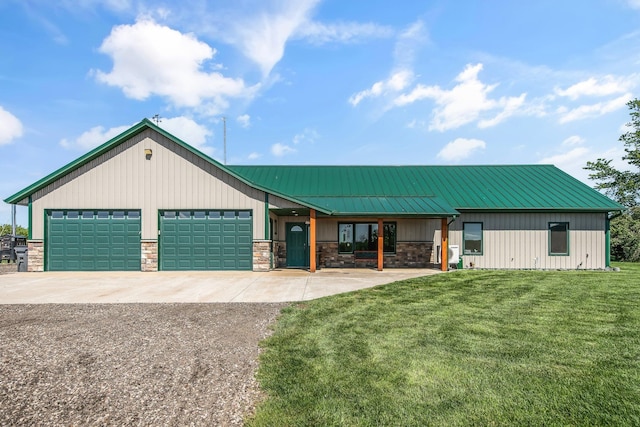 10080 550th St, Rock Creek, MN 55069 - view of front of property with driveway, stone siding, a standing seam roof, a front lawn, and an attached garage