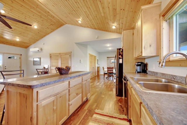 10080 550th St, Rock Creek, MN 55069 - kitchen with light brown cabinets, a sink, wooden ceiling, light wood-type flooring, and a wall mounted AC