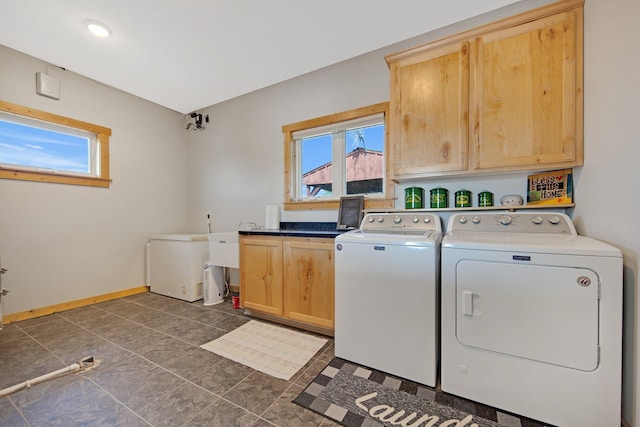 10080 550th St, Rock Creek, MN 55069 - washroom with washer and dryer, cabinet space, healthy amount of natural light, and baseboards