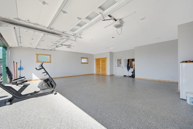10080 550th St, Rock Creek, MN 55069 - exercise room featuring baseboards and a garage