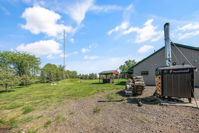 10080 550th St, Rock Creek, MN 55069 - view of green lawn with a gazebo and central air condition unit