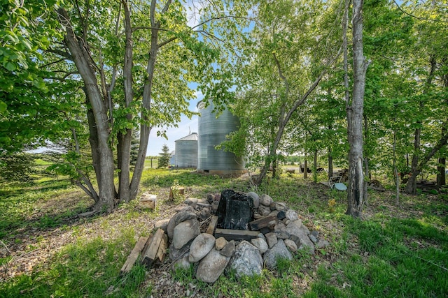 10080 550th St, Rock Creek, MN 55069 - view of yard with an outdoor fire pit