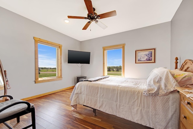 10080 550th St, Rock Creek, MN 55069 - bedroom featuring wood finished floors and a ceiling fan