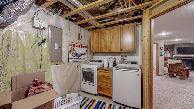 1215 Oak St, Lake City, MN 55041 - laundry room featuring electric panel, cabinet space, light colored carpet, washing machine and clothes dryer, and recessed lighting