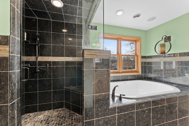 2701 Princeton Ave, Saint Louis Park, MN 55416 - bathroom featuring a garden tub and a tile shower