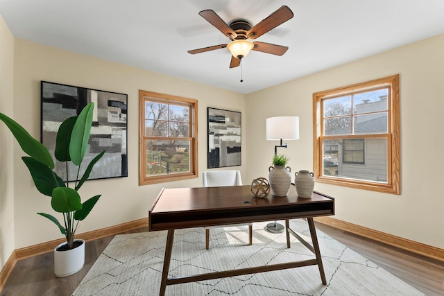 2701 Princeton Ave, Saint Louis Park, MN 55416 - office area featuring baseboards, wood finished floors, and healthy amount of natural light