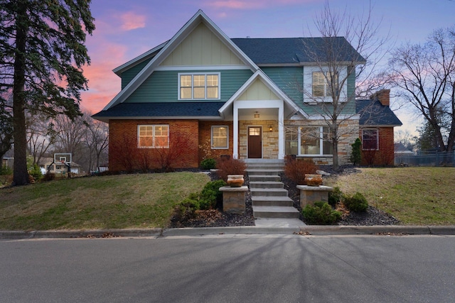 2701 Princeton Ave, Saint Louis Park, MN 55416 - view of front of home featuring board and batten siding and a yard