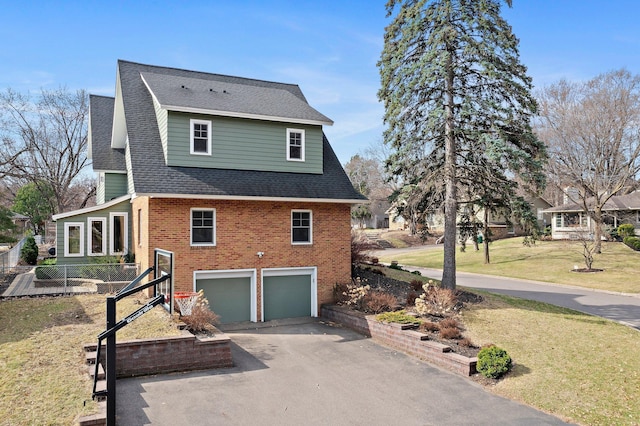 2701 Princeton Ave, Saint Louis Park, MN 55416 - view of side of property featuring a garage, driveway, brick siding, a lawn, and roof with shingles