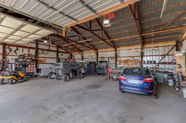 36037 678th St, Hill Lake Twp, MN 55748 - garage with a workshop area and a garage door opener