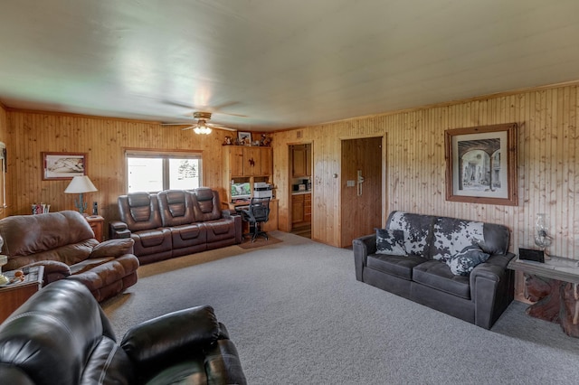 36037 678th St, Hill Lake Twp, MN 55748 - living room featuring carpet floors, wood walls, and ceiling fan