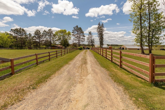 36037 678th St, Hill Lake Twp, MN 55748 - view of dirt / gravel road featuring a rural view