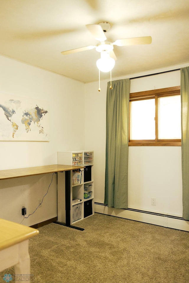 806 E St, Bottineau, ND 58318 - unfurnished office with carpet flooring, a ceiling fan, and a baseboard radiator
