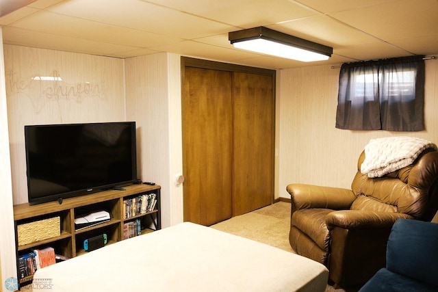 806 E St, Bottineau, ND 58318 - carpeted bedroom featuring a closet and a drop ceiling