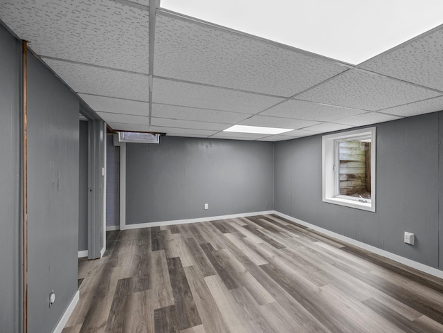 5252 5th St NE, Columbia Heights, MN 55421 - below grade area featuring wood finished floors and a drop ceiling