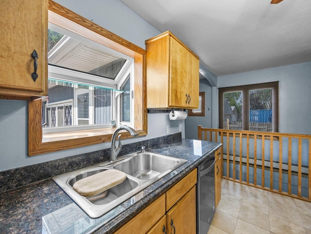5252 5th St NE, Columbia Heights, MN 55421 - kitchen featuring a baseboard radiator, dishwasher, and light tile patterned flooring