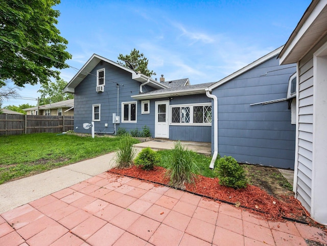 5252 5th St NE, Columbia Heights, MN 55421 - back of house featuring a patio