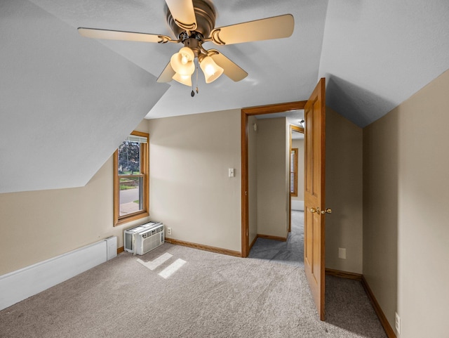 5252 5th St NE, Columbia Heights, MN 55421 - additional living space with ceiling fan, carpet flooring, lofted ceiling, and a wall mounted air conditioner