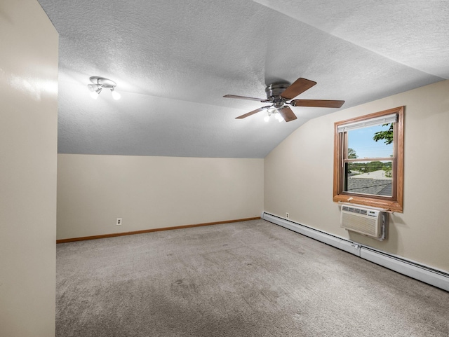 5252 5th St NE, Columbia Heights, MN 55421 - additional living space featuring lofted ceiling, carpet, ceiling fan, a baseboard radiator, and a wall unit AC