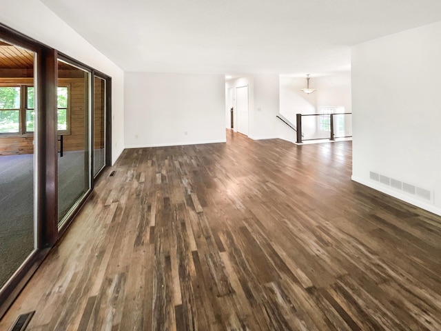 5617 220th St N, Forest Lake, MN 55025 - unfurnished living room featuring dark wood-style flooring