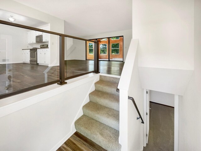 5617 220th St N, Forest Lake, MN 55025 - stairway featuring wood finished floors