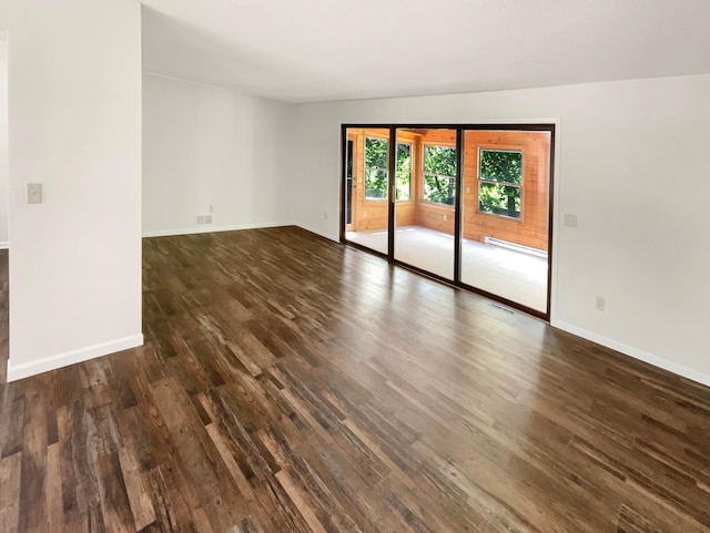 5617 220th St N, Forest Lake, MN 55025 - spare room with dark wood-style floors and baseboards