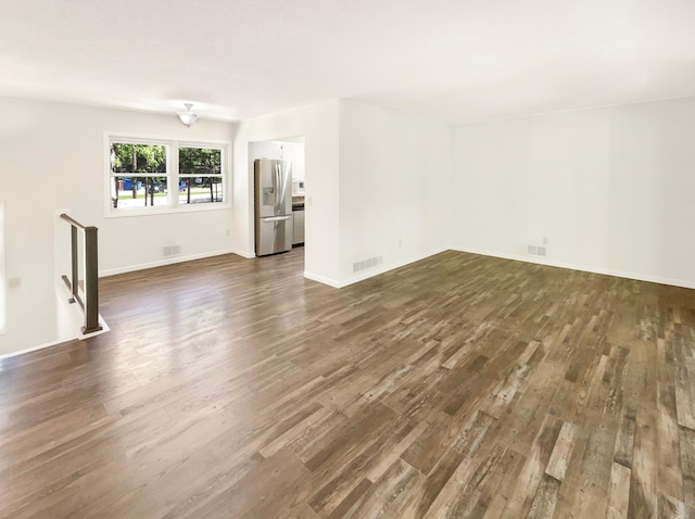 5617 220th St N, Forest Lake, MN 55025 - unfurnished room with dark wood-style floors and baseboards