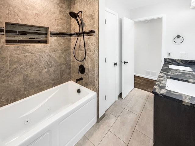 5617 220th St N, Forest Lake, MN 55025 - bathroom with a combined bath / shower with jetted tub, double vanity, and tile patterned floors