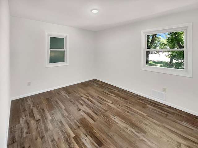 5617 220th St N, Forest Lake, MN 55025 - empty room with wood finished floors and baseboards