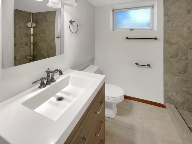 5617 220th St N, Forest Lake, MN 55025 - full bathroom with vanity, tiled shower, tile patterned floors, toilet, and baseboards