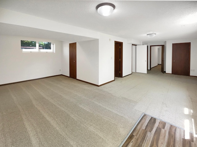 5617 220th St N, Forest Lake, MN 55025 - carpeted empty room featuring baseboards and a textured ceiling