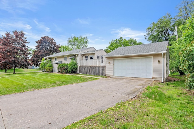 1700 Laramie Trl, Brooklyn Park, MN 55444 - view of front of home with a front lawn and a detached garage