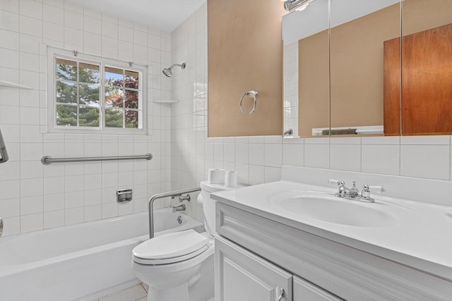 1700 Laramie Trl, Brooklyn Park, MN 55444 - bathroom featuring tile walls, vanity, and bathing tub / shower combination