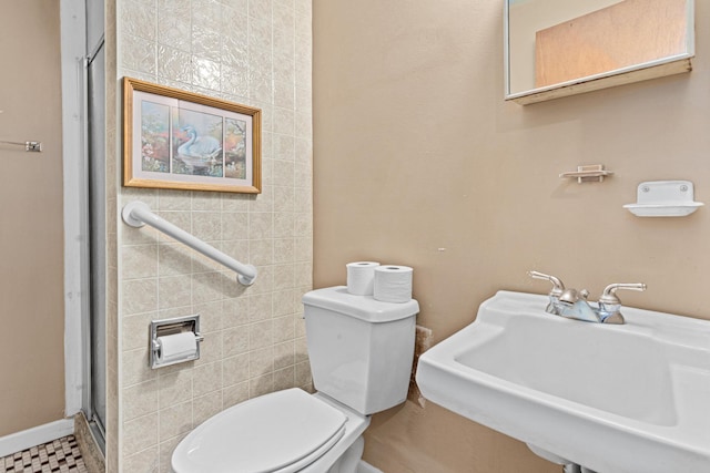 1700 Laramie Trl, Brooklyn Park, MN 55444 - bathroom featuring a sink and a stall shower