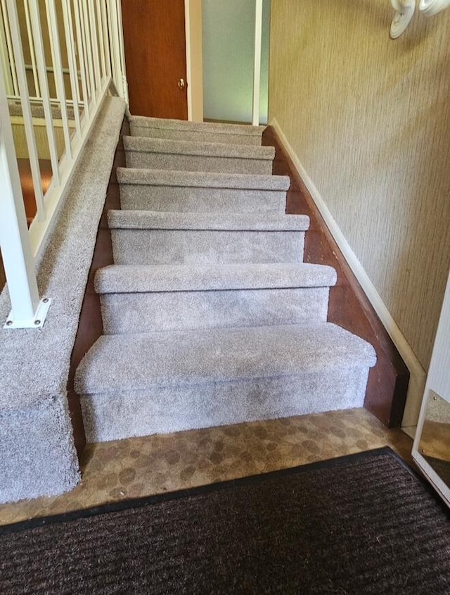 1700 Laramie Trl, Brooklyn Park, MN 55444 - staircase with wallpapered walls